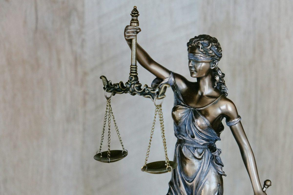 A statue of the scales of justice